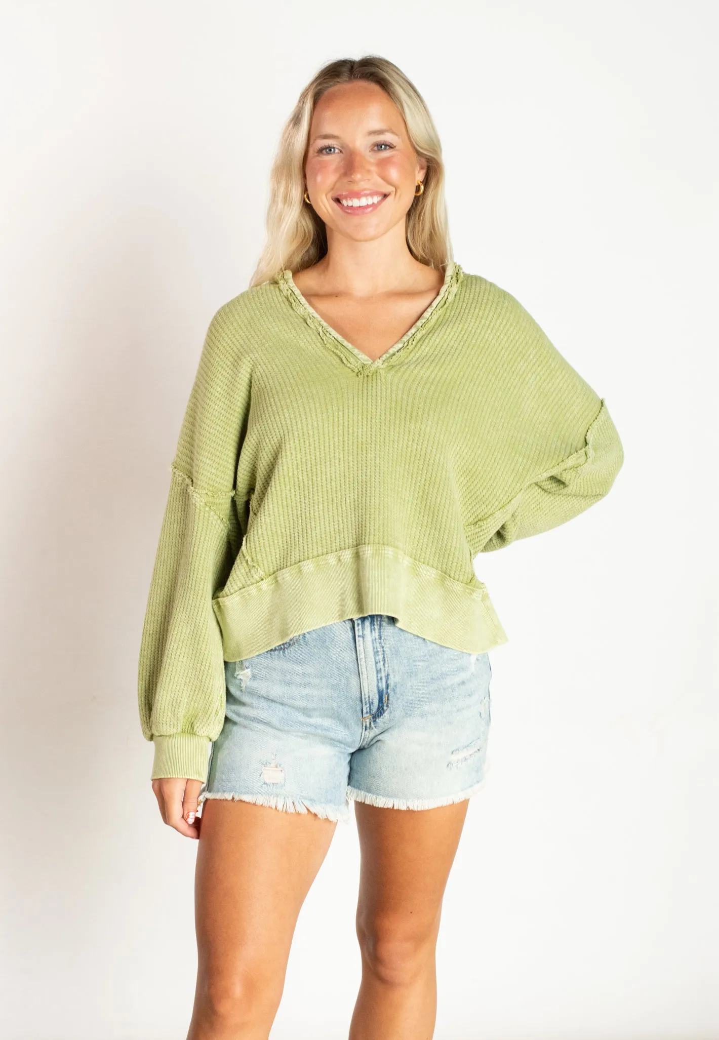 Well Traveled Green Sweater