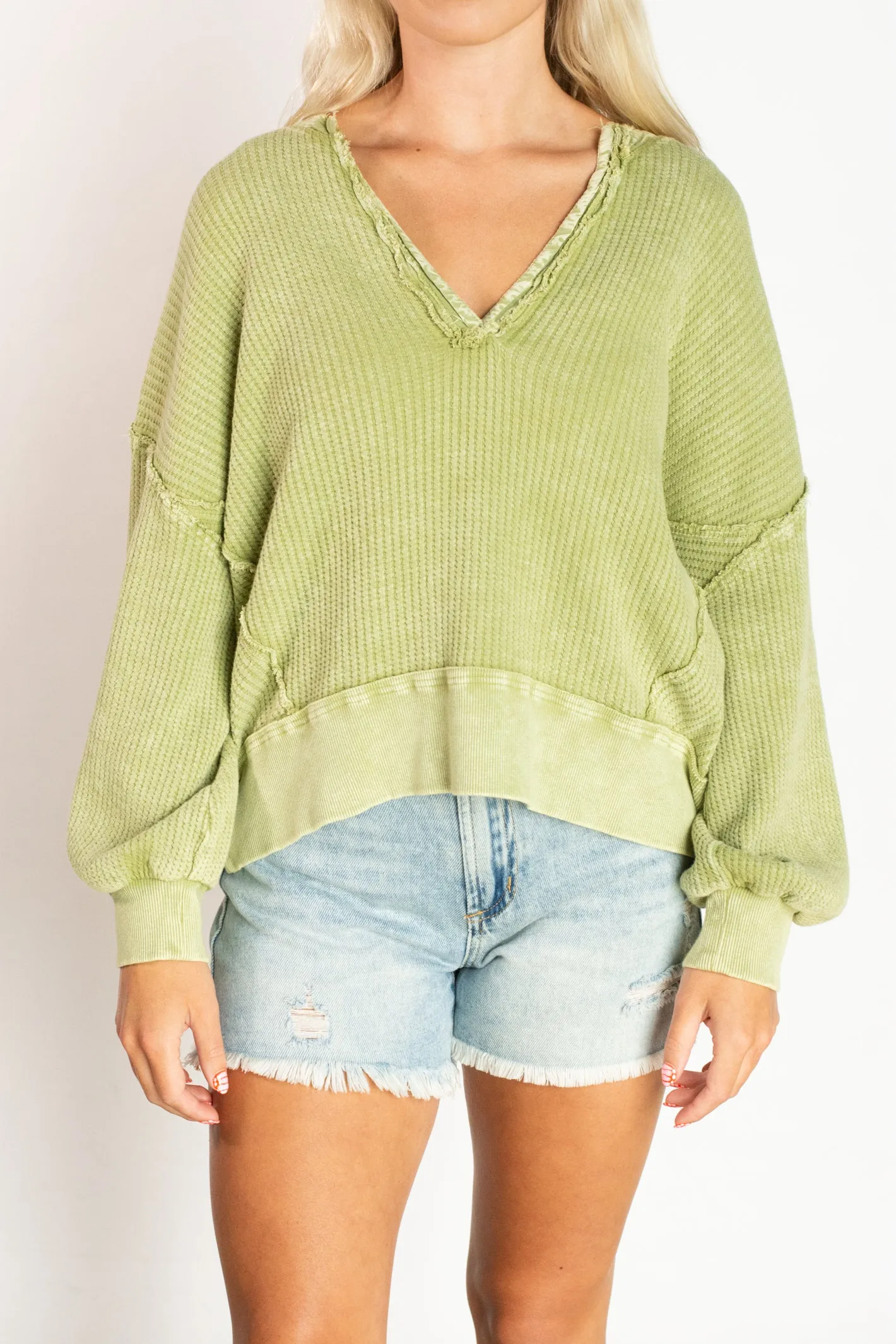 Well Traveled Green Sweater